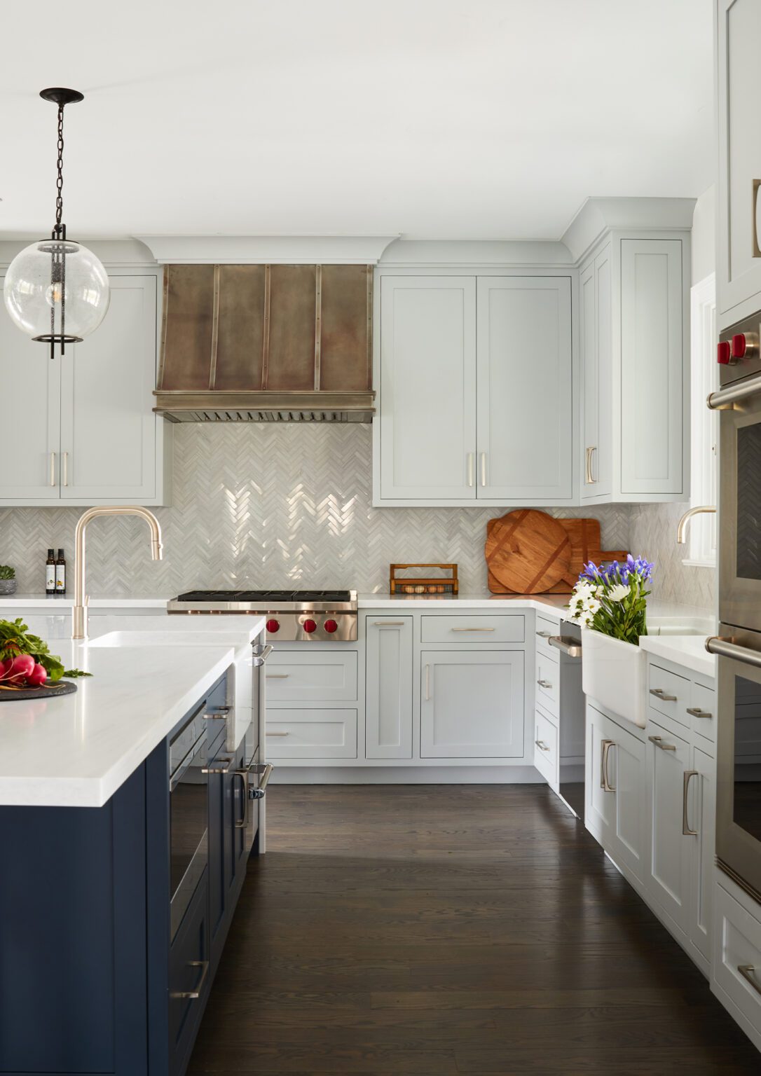 a gray and blue kitchen with a refined look.